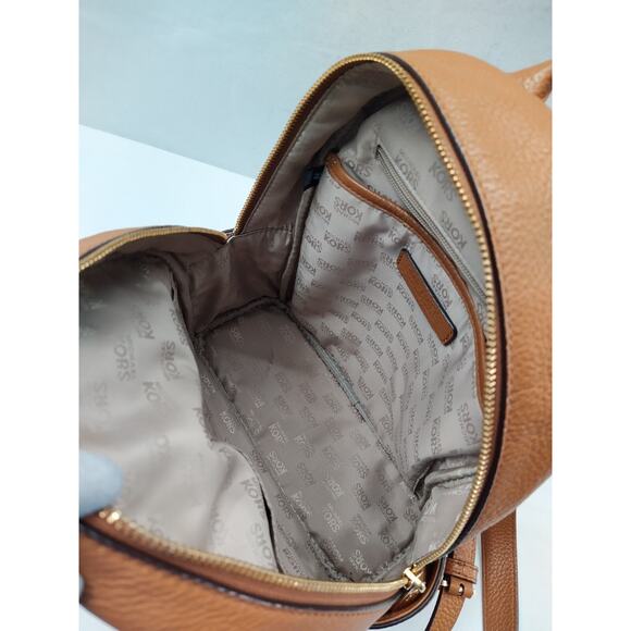 Michael Kors Tan Brown Pebbled Leather Pocket Zip Around Backpack - Picture 14 of 16